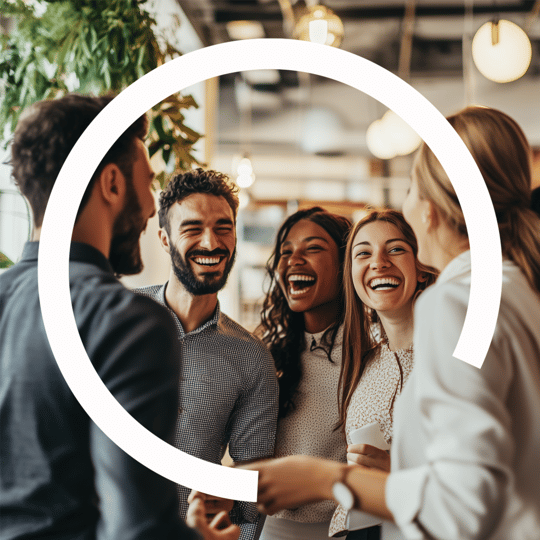 Three women and two men smiling together